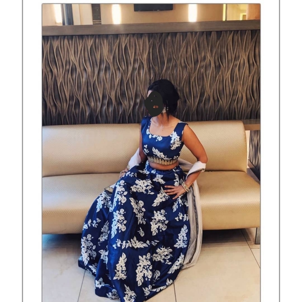 Blue silk lehenga with floral self prints